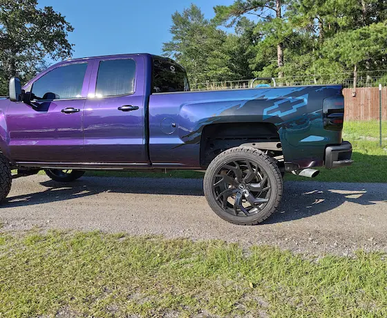 Chevy truck wrapped in color shift from blue to purple, Austin