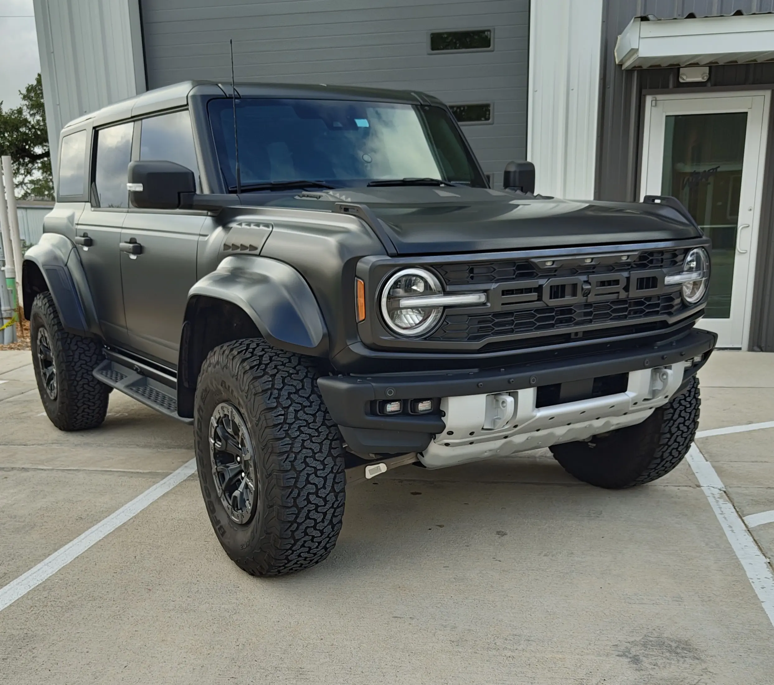 Satin black wrap on a Ford Bronco Raptor — Austin TX