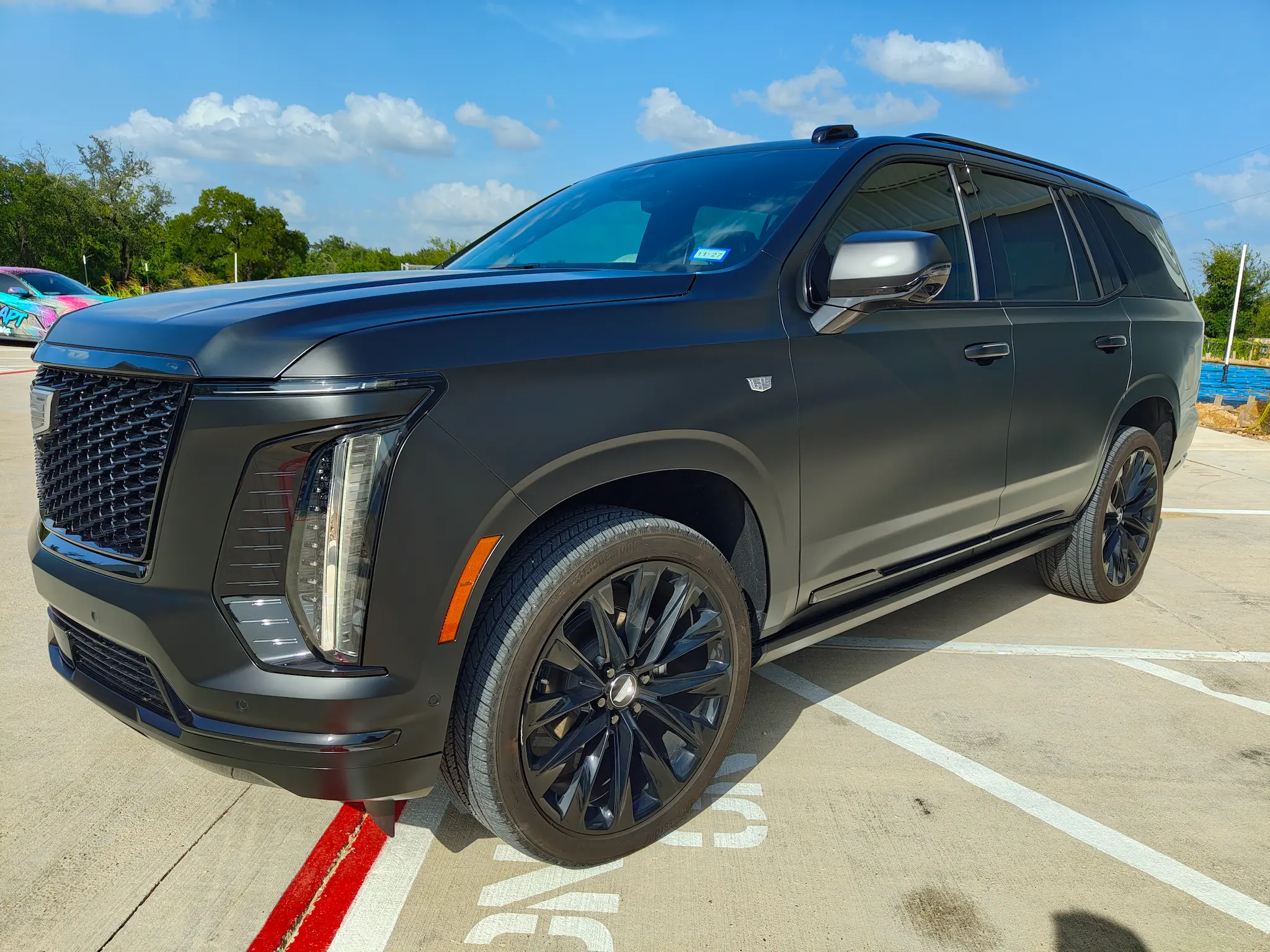 Satin black wrap on a Cadillac Escalade — Leander TX